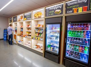 man checking out at grab and go micro market