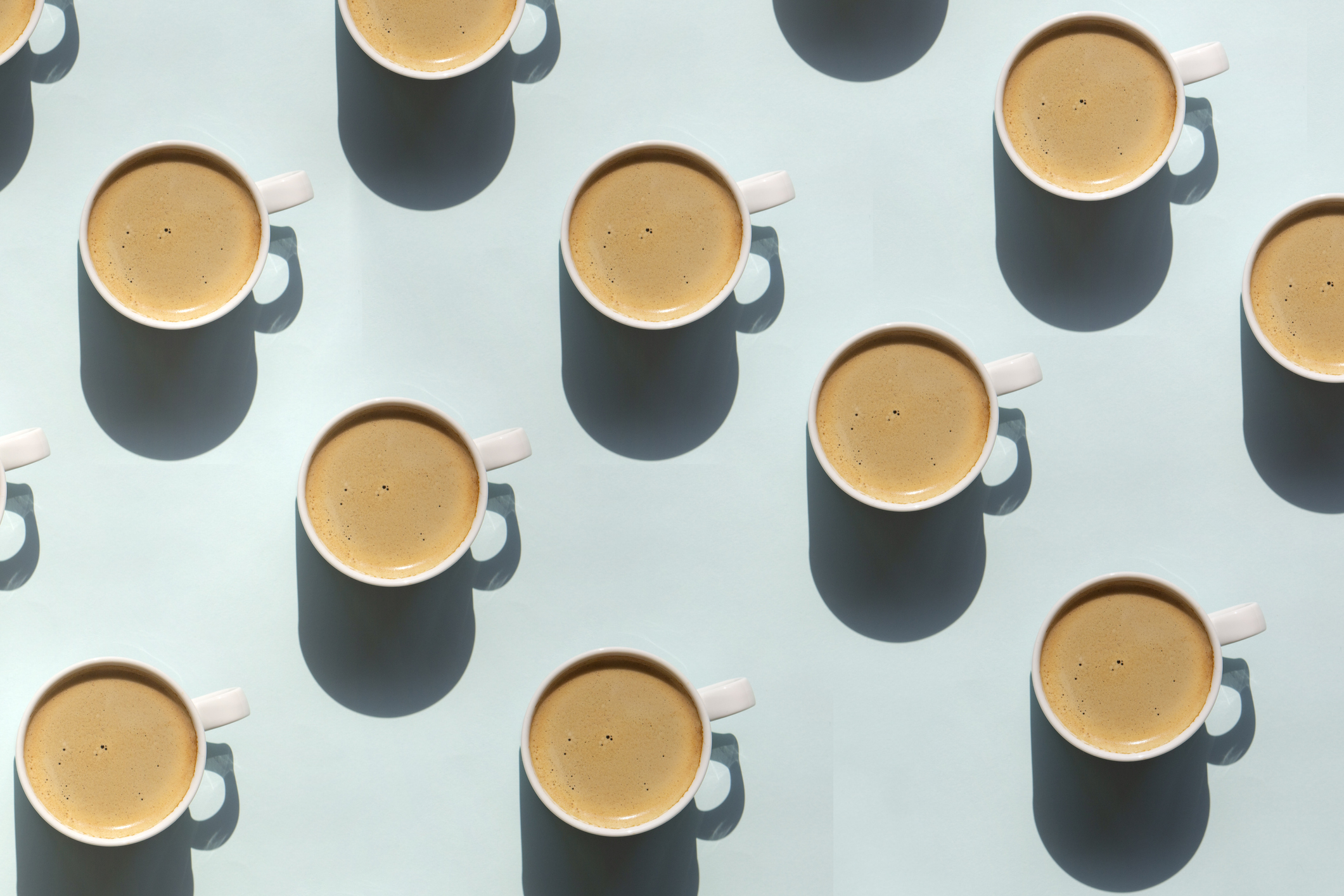 overhead view of cups of cappuccinos