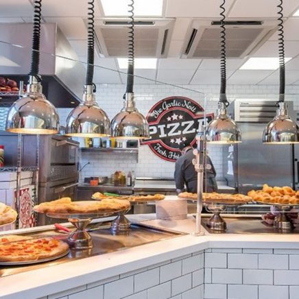 Display of available pizza options plus garlic knots and Stromboli