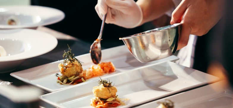 Chef preparing food, meal, in the kitchen, Chef decorating dish, closeup, chef at work