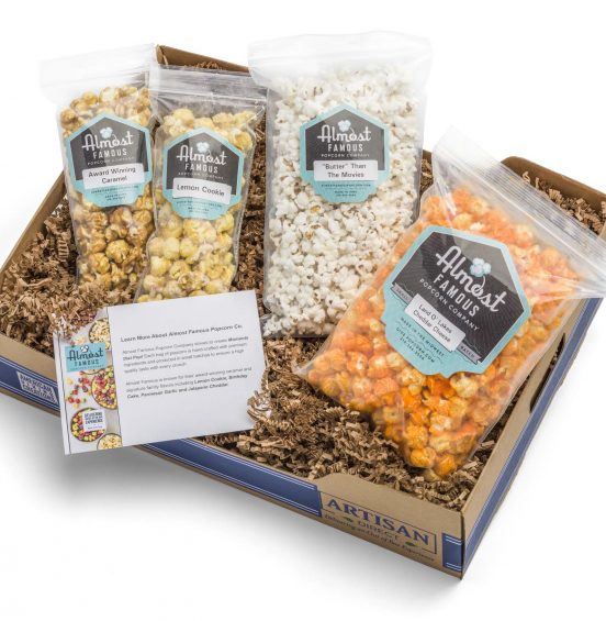 Box of Popcorn, cheddar cheese flavor, butter flavor, caramel flavor, and lemon cookie flavor