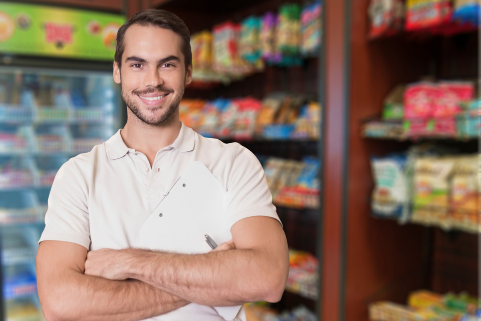 Man Smile with clipboard in hands