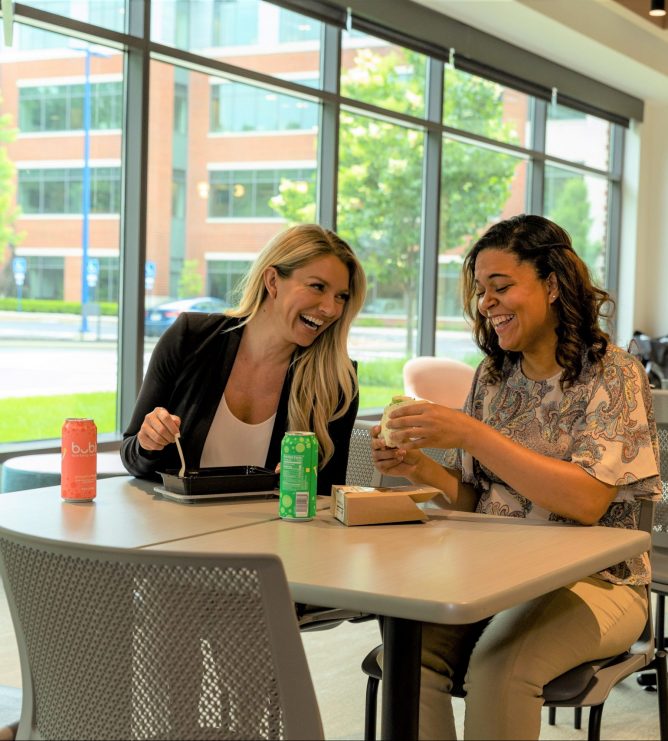 employees eating lunch together